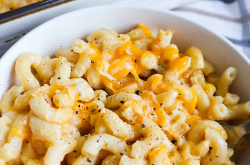A bowl of mac and cheese and a baked dish