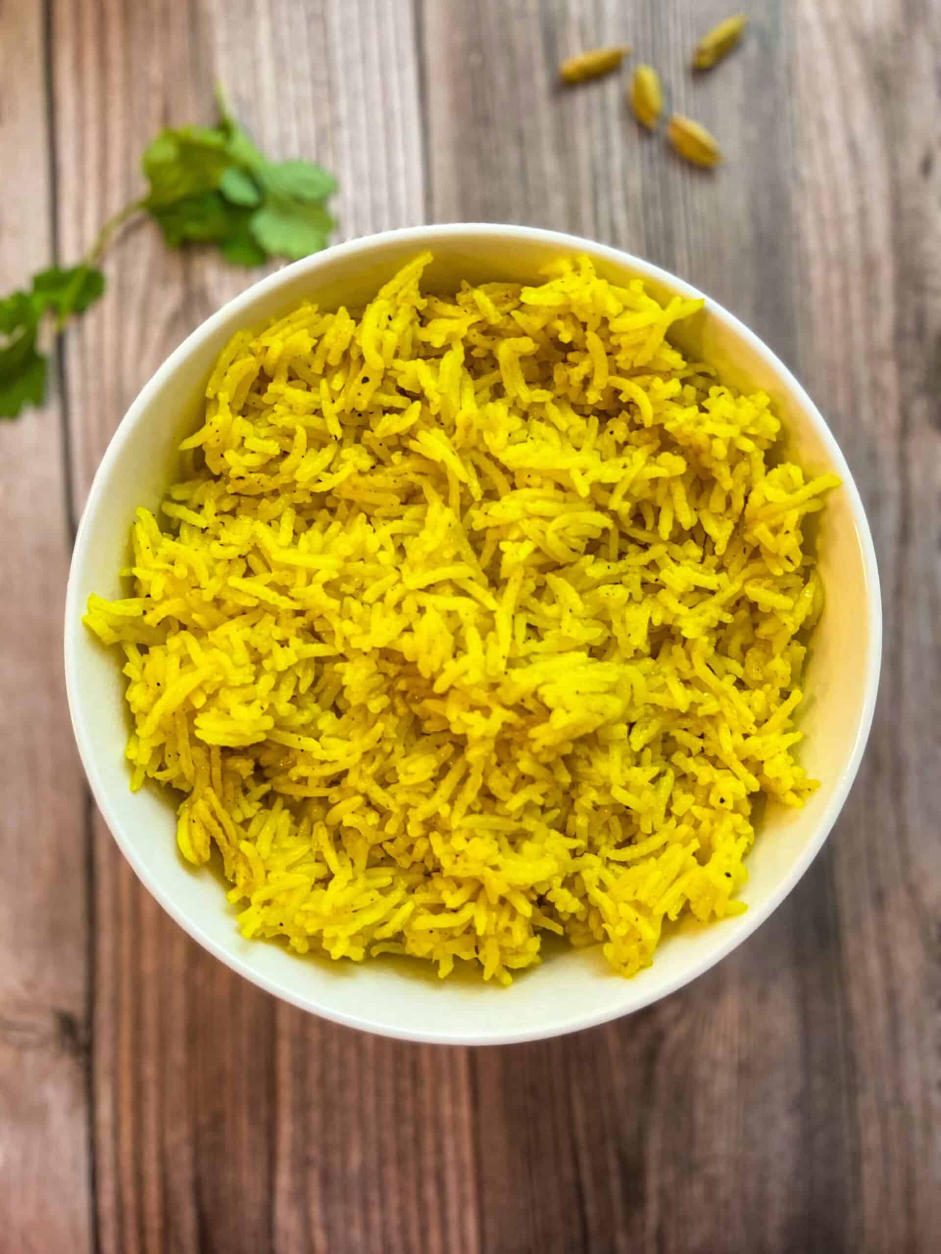 A bowl of turmeric yellow basmati rice.