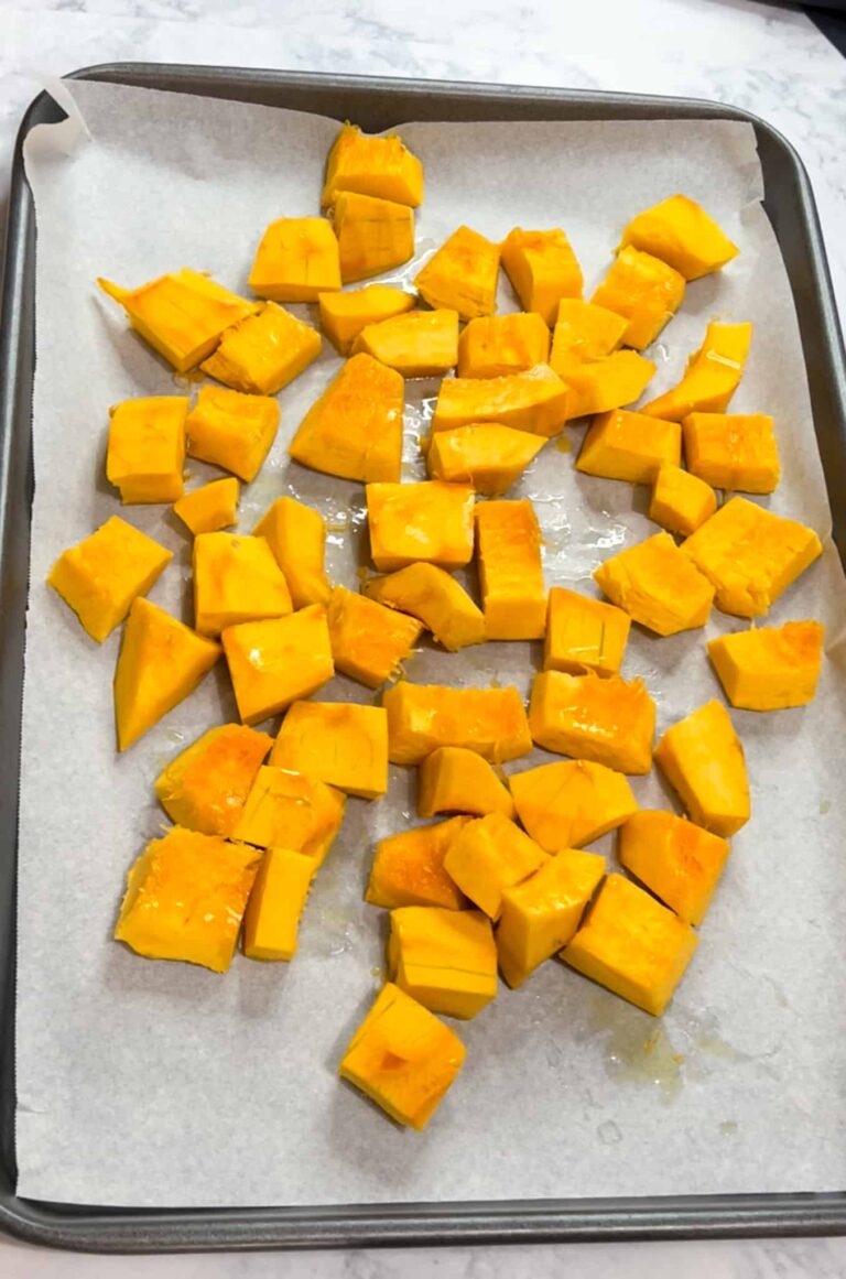 An oven tray of pumpkin chunks