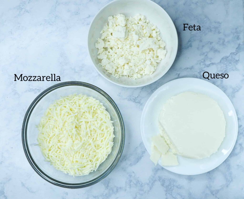 A bowl of moozarella, feta and queso