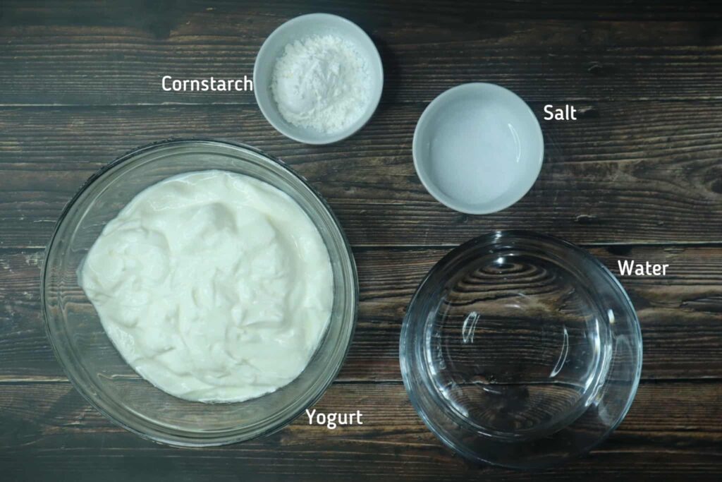 A bowl of yogurt, salt, cornstarch and water