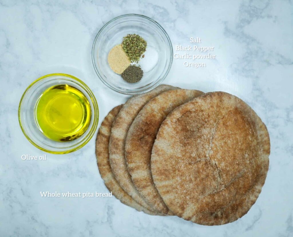 4 pita breads, a bowl of olive oil and spices
